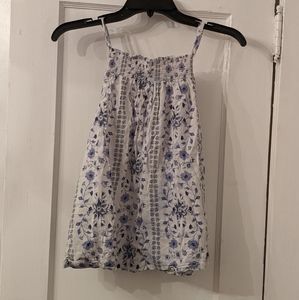 Printed sleeveless smocked high-neck tank
